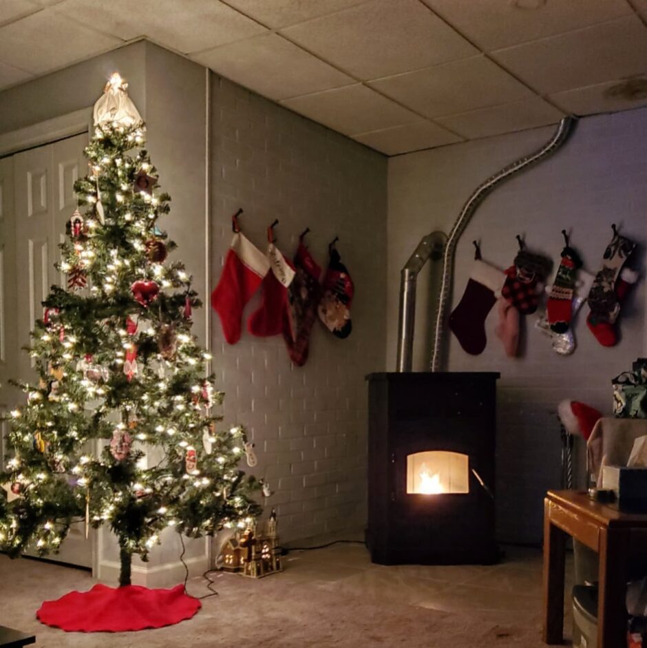 Photo of the pellet stove we installed this year next to our Christmas tree | Making the Most Blog